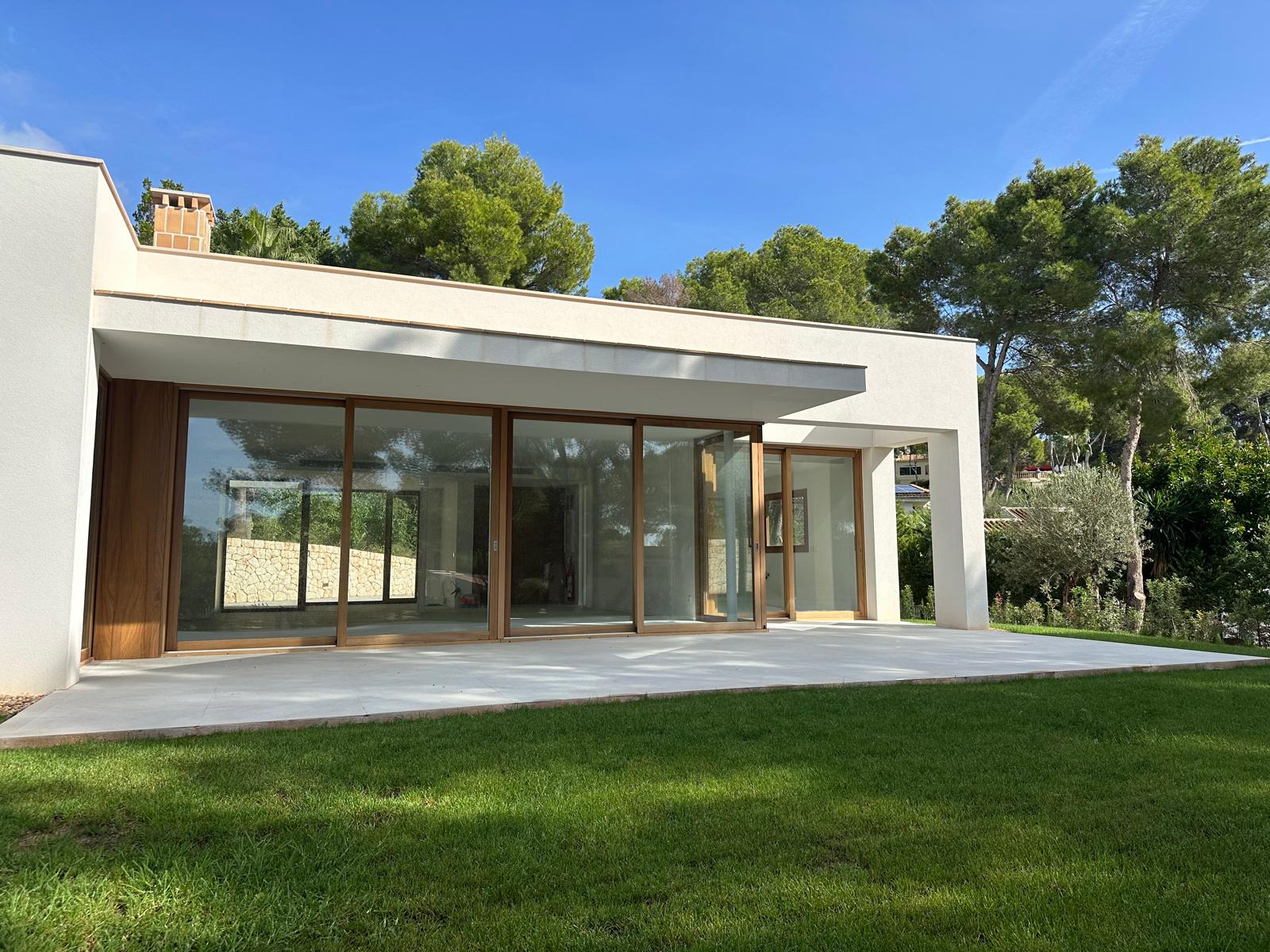 Villa exterior with terrace and garden